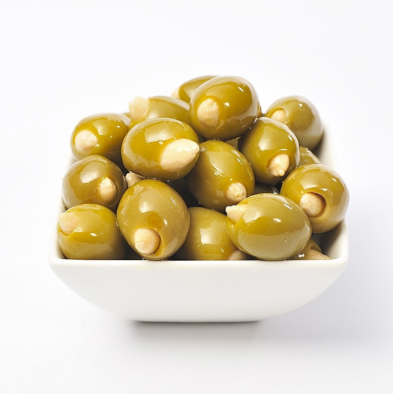 Almond Stuffed Colossal Olives in a blend of Sunflower Oil and Extra